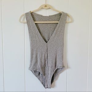 Grey V-neck sleeveless body suit
